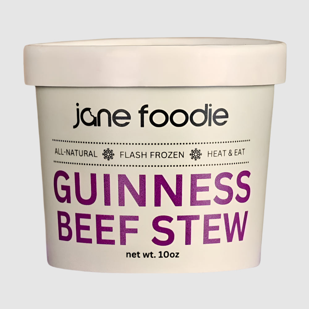 ane Foodie Guinness Beef Stew 10 oz container with front label showing all-natural, flash frozen, heat & eat product.