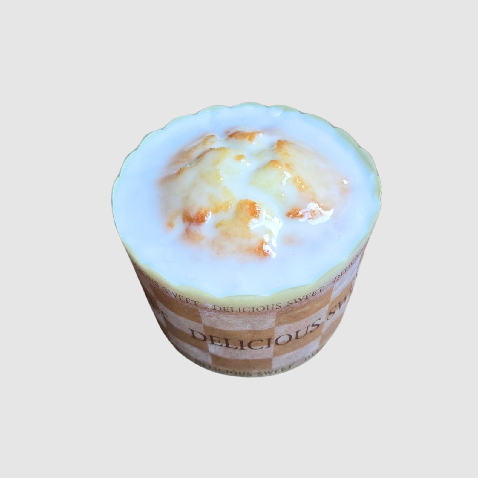 Mini Lemon Cake with lemon glaze on a light gray background
