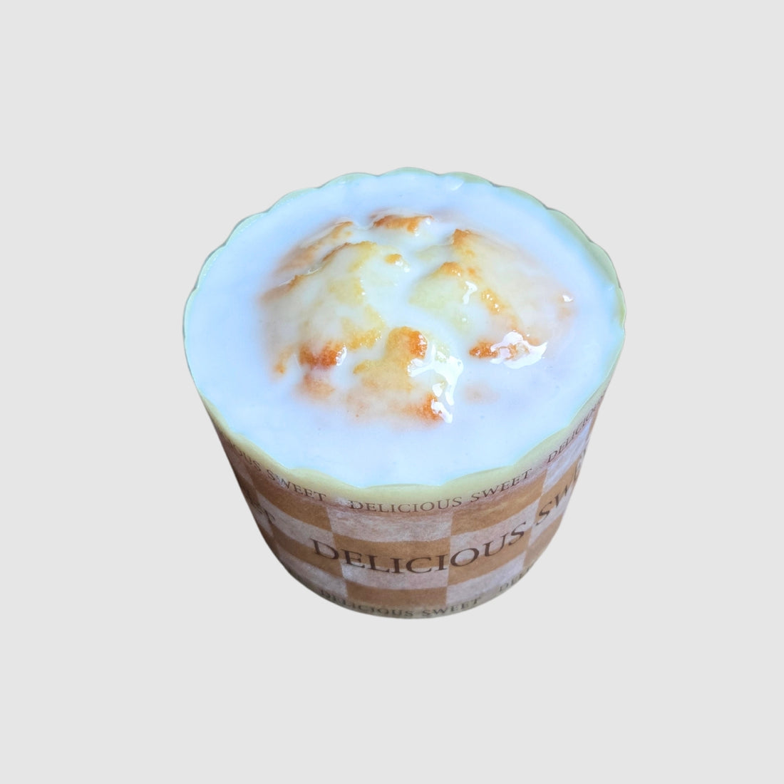 Mini Lemon Cake with lemon glaze on a light gray background