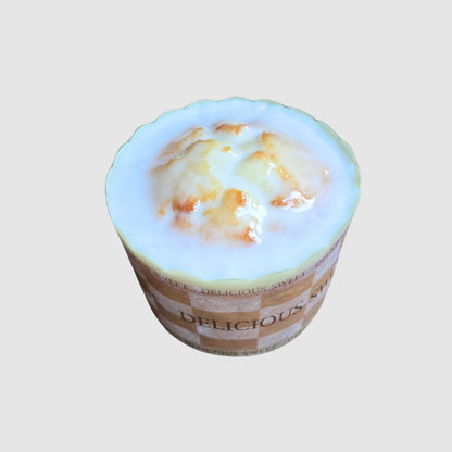 Mini Lemon Cake with lemon glaze on a light gray background