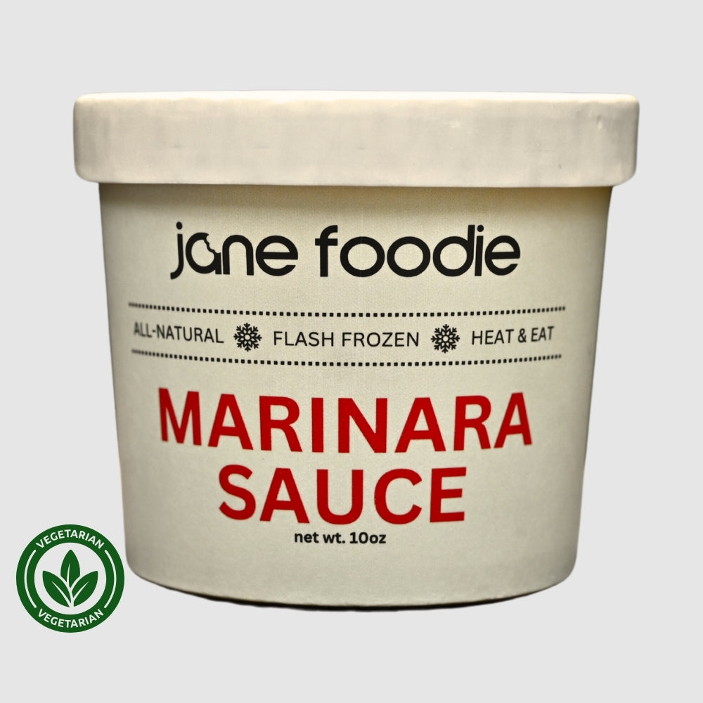 Container of jane foodie marinara sauce on a white background