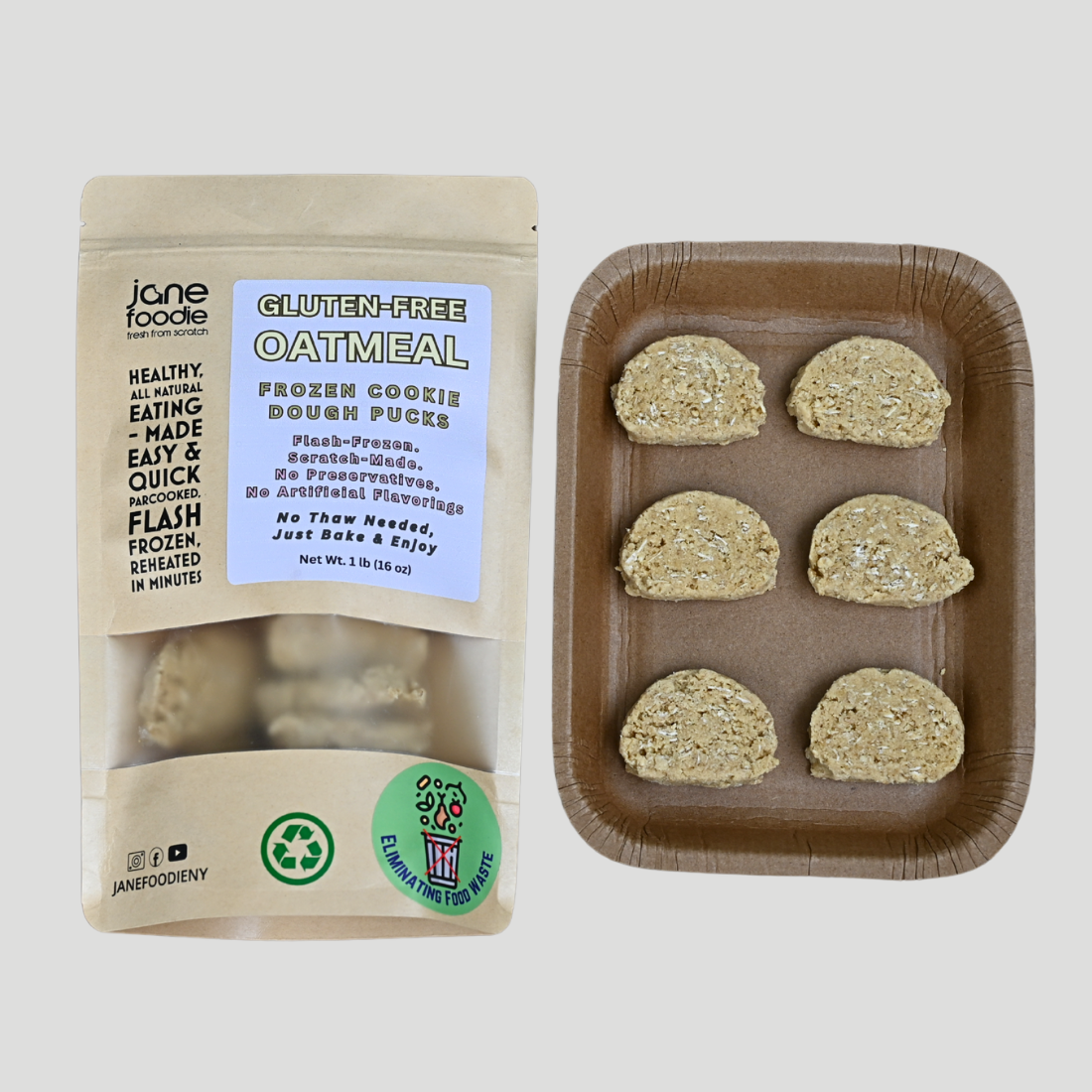 Gluten-free oatmeal frozen cookie dough pucks in clear packaging with kraft baking tray on white background